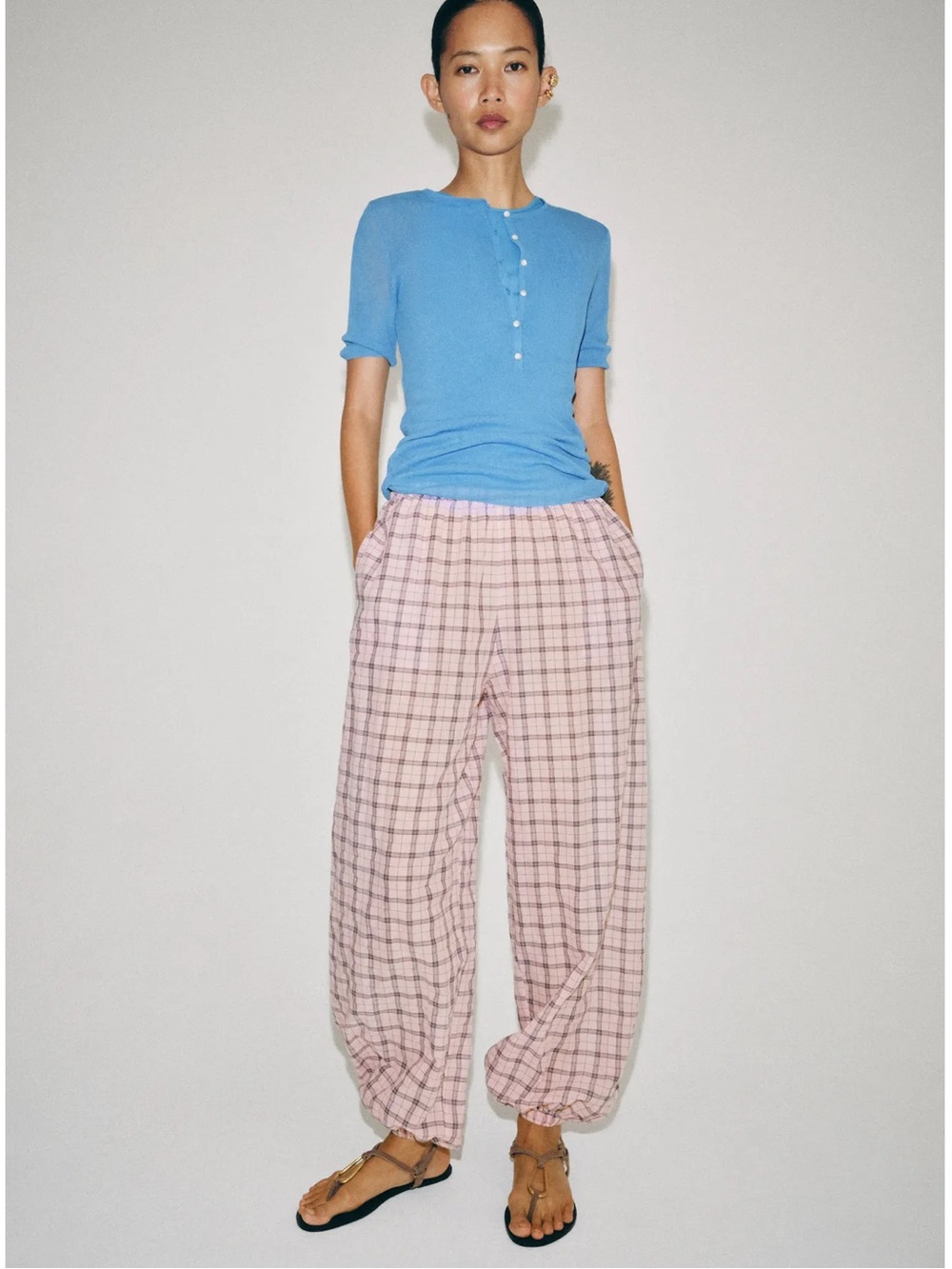 ZARA ZW Collection plaid balloon pants feature a mid-rise elastic waistband